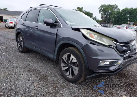 2016 Honda Cr-V Touring from USA, damaged, VIN 5J6RM4H90GL033671